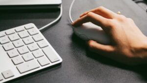 hand using computer mouse