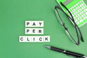 scrabble tiles spelling out pay per click